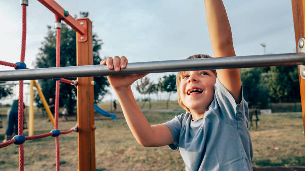 istock a kid plays happily on the playground 1754702662