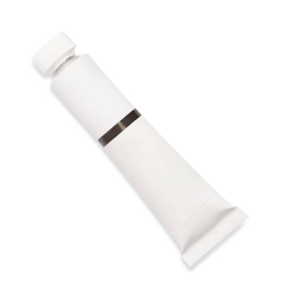 istock Tube with oil paint on white background, top view 1754702873