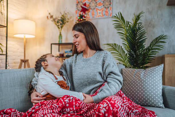 istock Mother and daughter spending time together during Christmas holidays 1754707530