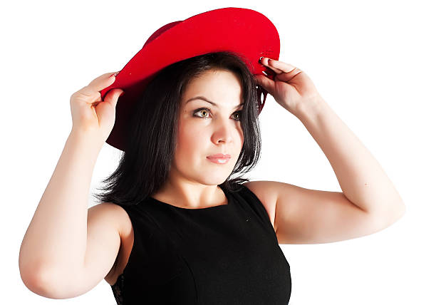 istock young beautiful woman with red hat 175471866
