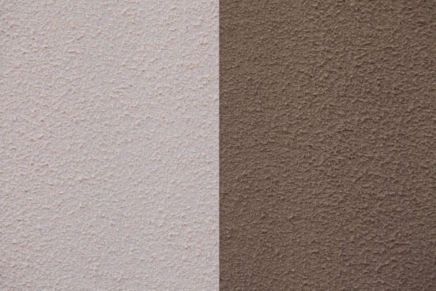 istock Facade textured paint, concrete wall, brown and dusty pink cement background paint with small texture details. 1754727734