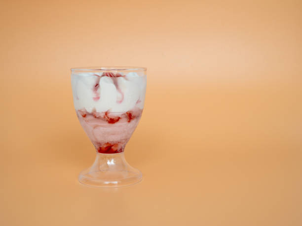 istock Ice cream on a bright orange background. 1754759411
