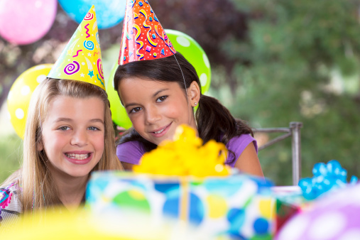 Two friends at a birthday partyPlease see similar images in my portfolio: