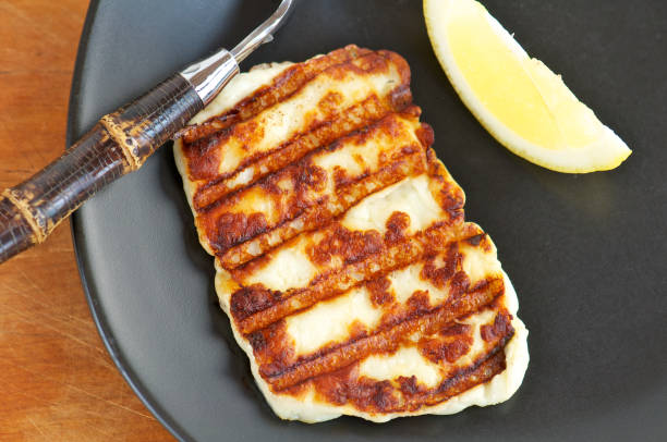istock Grilled Halloumi Cheese on Black Plate from Above 175479231