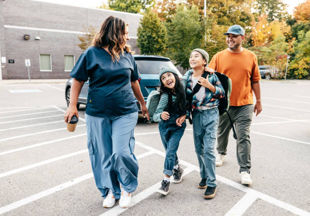istock Parents drop in kids at school 1754793776