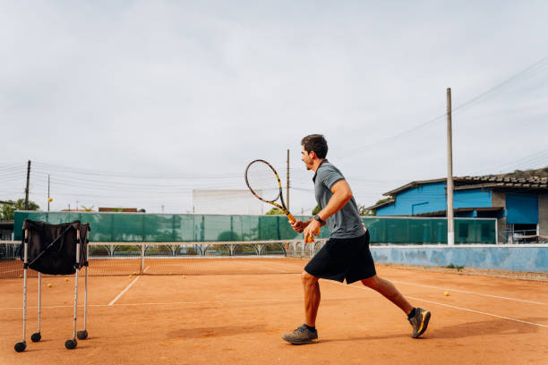 istock Open view of man playing tennis 1754799157