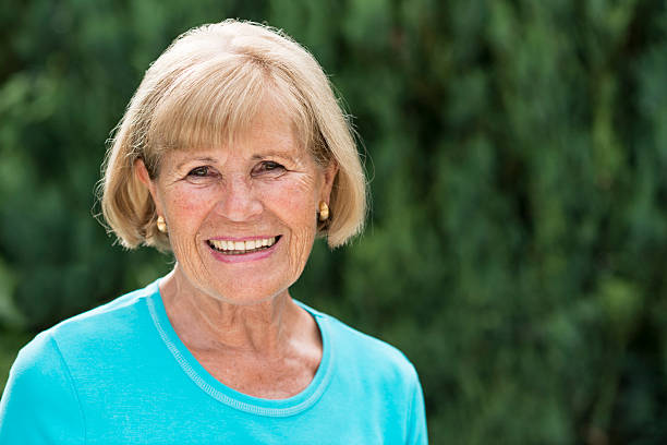 istock smiling senior woman 175481275
