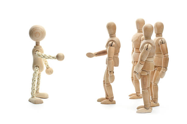 Dont be afraid of enemys - Wooden Mannequin and Alien. Concept for Mediation, teamwork, new member, enemys, Aliens, racial problems... Be creative too :)