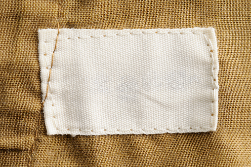Close-up of a blank white clothing label