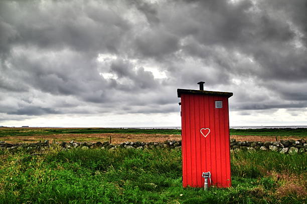 Outhouse "Red wooden outhouse, Sweden" Outhouse stock pictures, royalty-free photos & images