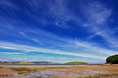 Scottish beach at low tide on a sunny day