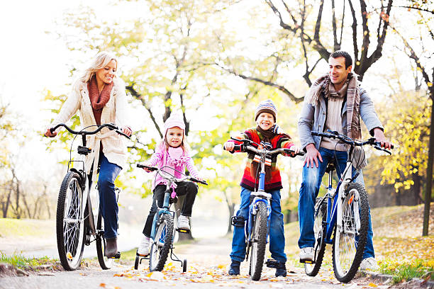istock Happy family riding bicycles in nature. 175481957