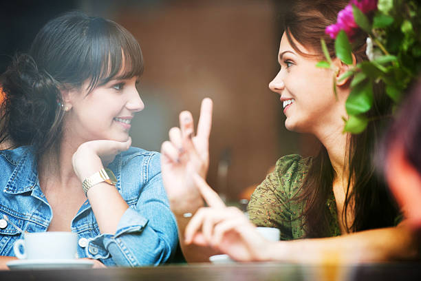 istock Two best friends sitting in a cafe and talking. 175482091
