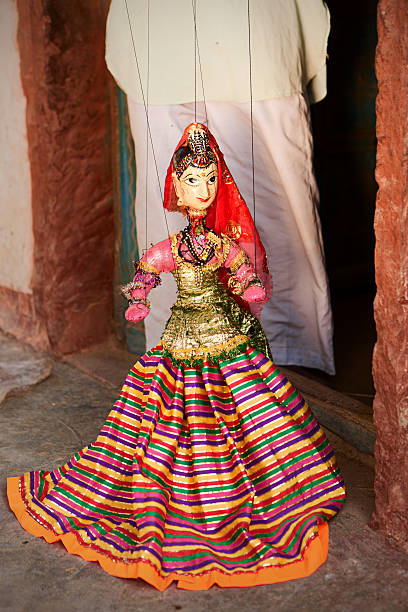 istock Indian man showing how to play with puppets. Thar Desert, 175482531
