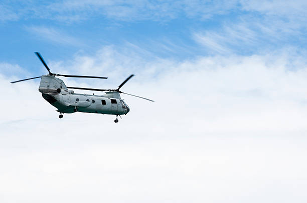 San Diego, California - September 2009: US Army Boeing CH46 transport helicopter formation landing in the combat area bringing support troops