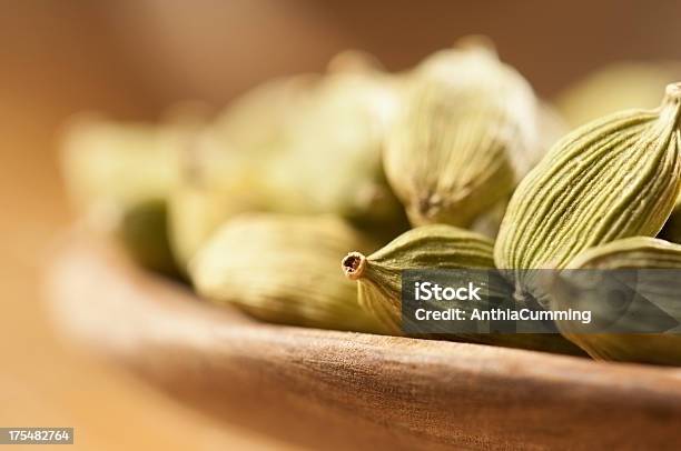 Green Cardamom Seeds In Small Wooden Bowls Stock Photo - Download Image Now - Cardamom, Seed, Indian Food