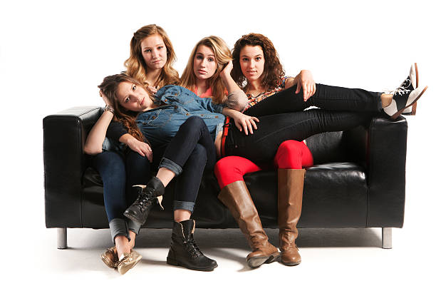 istock Teen Models with Black Sofa on White Background Hz 175483108