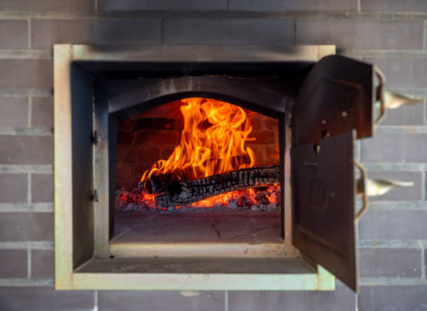 istock Heating a traditional wood-burning oven lit with refractory bricks in igloo format 1754833553