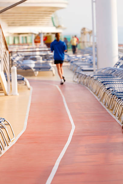 istock Woman jogging on cruise ship main deck 175483423
