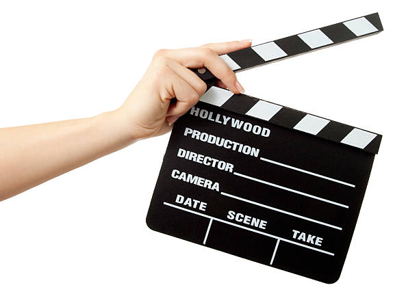 Hollywood Slate board in woman hand isolated Hand holding "Black empty Hollywood Slate board" isolated on white background  actress photos stock pictures, royalty-free photos & images