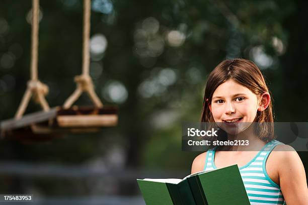 Happy With A Book Stock Photo - Download Image Now - 8-9 Years, Adult, Book