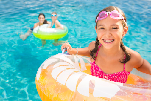 Family in swimming pool