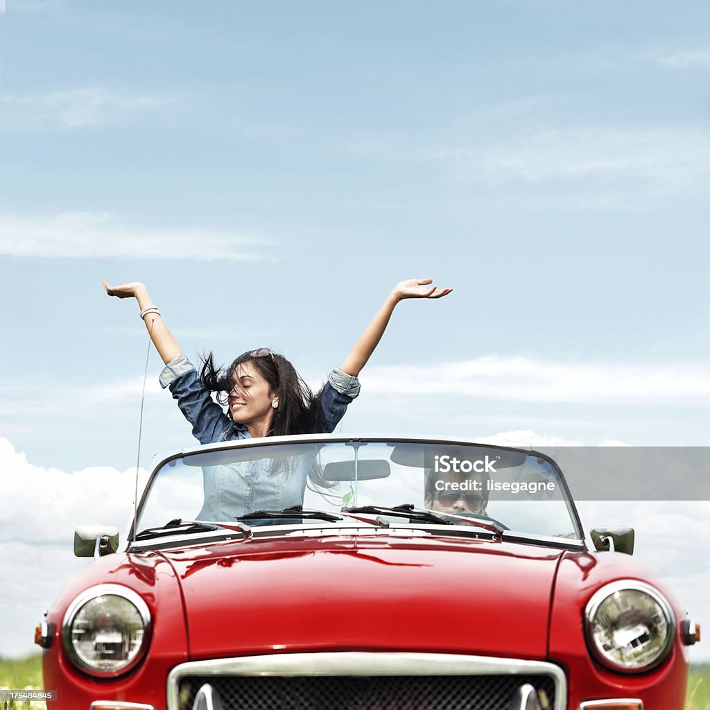 Happy young people in a cabriolet Car Stock Photo