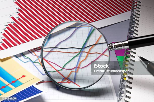 Graphs And Charts Stock Photo - Download Image Now - Graph, Magnifying Glass, Organization
