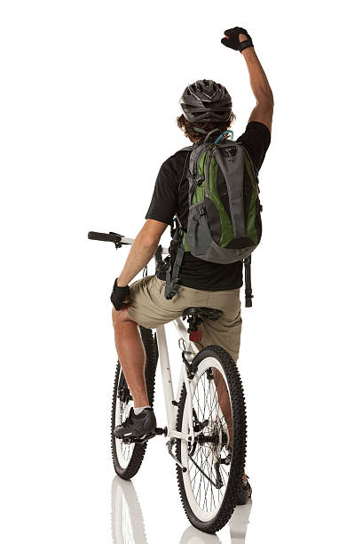 istock Rear view of cyclist riding a bicycle 175485086