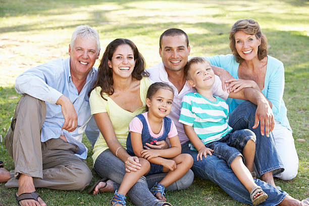 istock Three Generation Family Relaxing In Summer Park 175485094