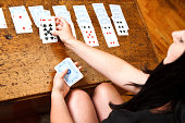Hands Playing Solitaire Card Game