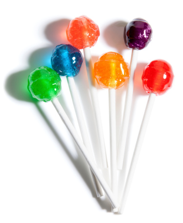 Group of colorful lollipops isolated on a white background.