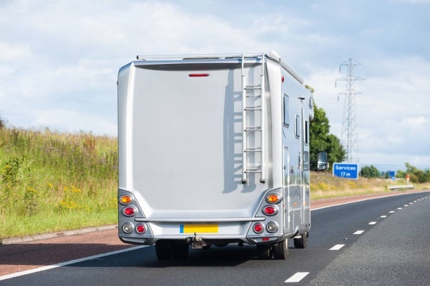 Camper van (motorhome) travelling south on the M6 stock photo