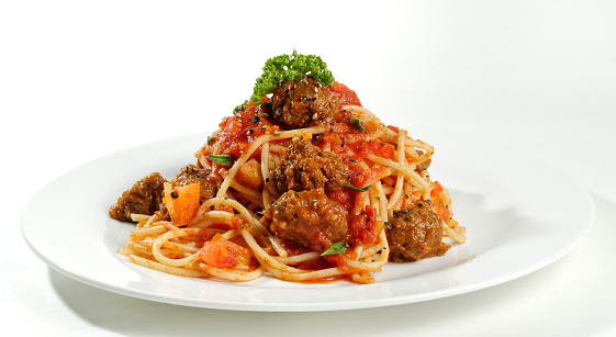 Classic meatball and spaghetti on a plate.
