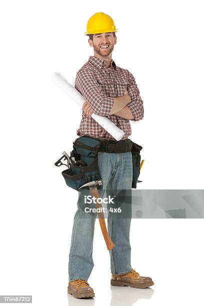 Happy Carpenter Standing With His Arms Crossed Stock Photo - Download Image Now - Construction Worker, Cut Out, White Background