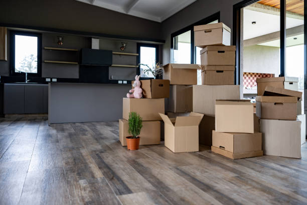 istock Pile of boxes while packing - moving house 1754872635