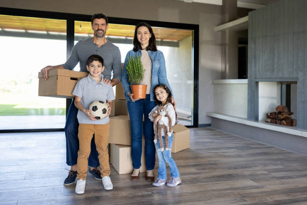 istock Happy family moving house 1754872641