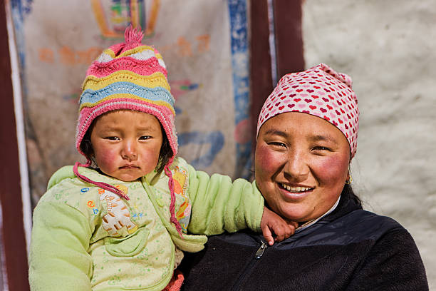 istock Nepali woman with her baby 175487676