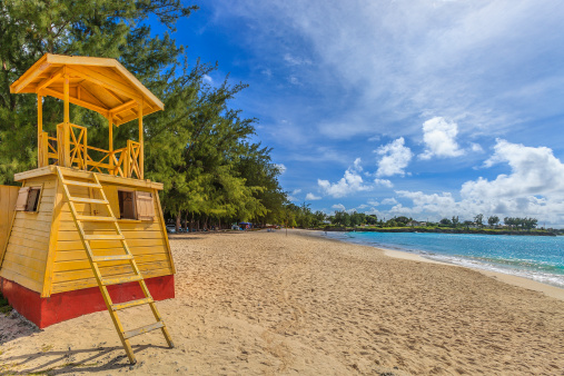 Lifeguard hut on Miami Beach, also known as Enterprise beach. This beautiful wide stretch of white sand, rarely crowded, overlooks a calm turquoise sea in the south of Barbados.