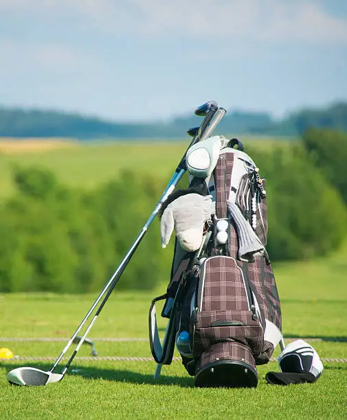golfbag on driving-range fairway close-up