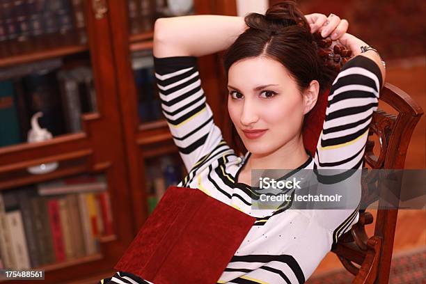 Student Taking A Break From Studying In Library Stock Photo - Download Image Now - Adult, Adults Only, Antique