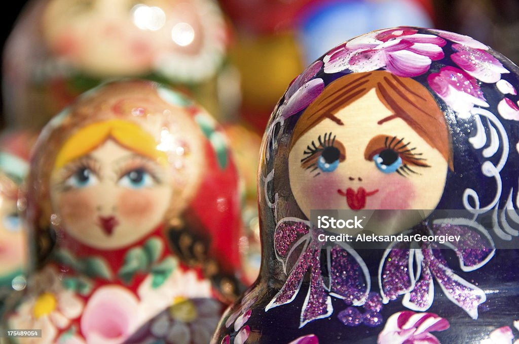 Hand painted Babushka or Matryoshka Russian Nesting dolls Original Babushka or Matryoshka Nesting Russian Dolls. Colorful, hand painted nesting dolls - traditional symbol of Russia. Photo was taken in old bazaar in Moscow, Russia. Russia Stock Photo