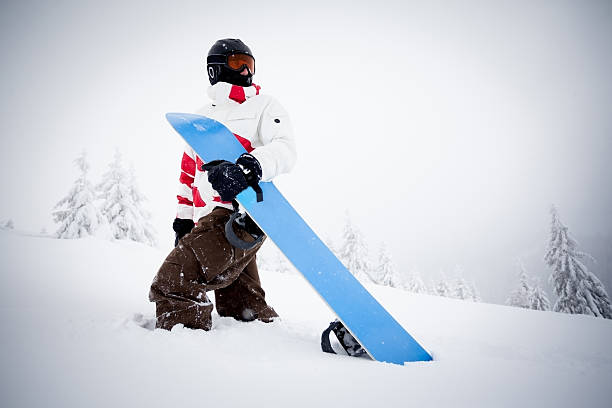 Lonley snowboarder on the mountain
