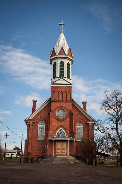 istock Church Country Landscape Trees Houses Sky Clouds Streets Steps Bricks 175489237