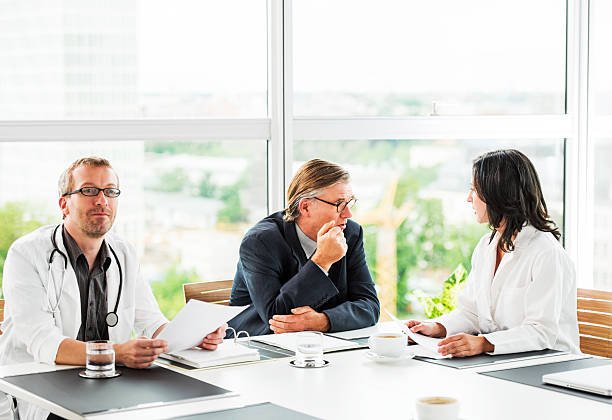 istock Businessmen having a meeting with doctors. 175489265