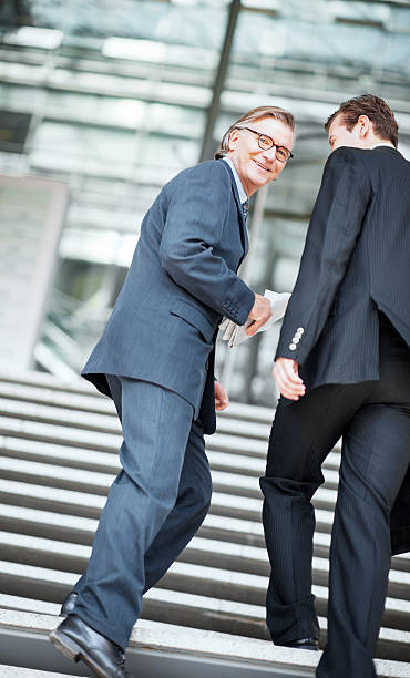 istock Businessmen walking up the stairs. 175489281