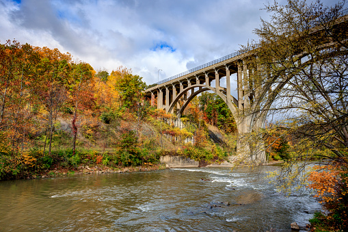 Delaware Water Gap panorama in Autumn with colorful foliage with forest and mountain over river.