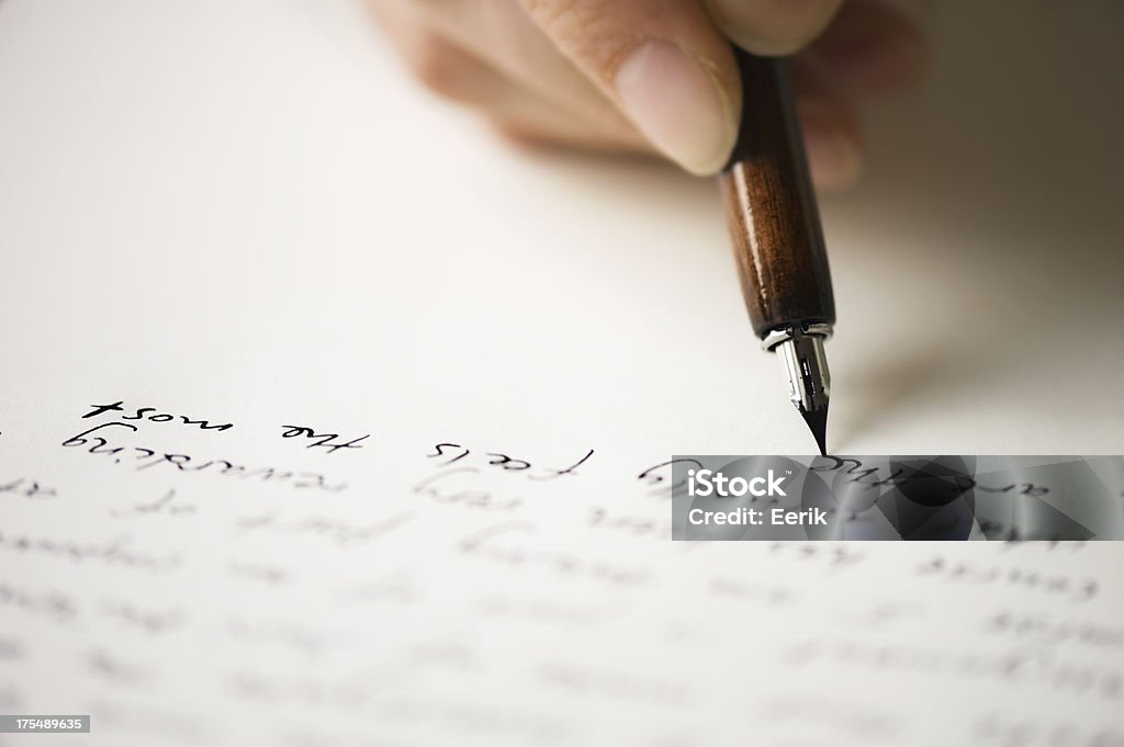 Writing letter to a friend Writing letter to a friend. Selective focus and shallow depth of field. Writing - Activity Stock Photo