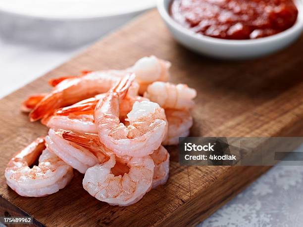 Cooked Shrimps On Wooden Board Next To Red Sauce Stock Photo - Download Image Now - Shrimp Cocktail, Shrimp - Seafood, Prawn - Seafood