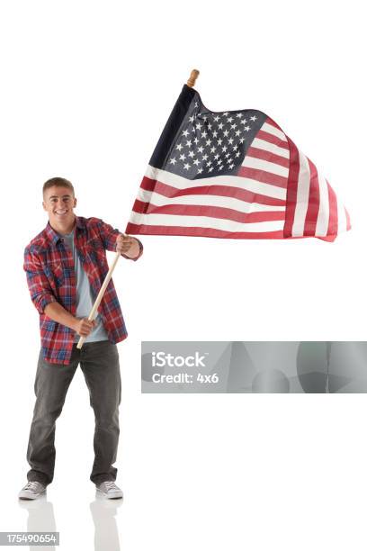 Man Waving An American Flag Stock Photo - Download Image Now - Flag, Holding, One Person